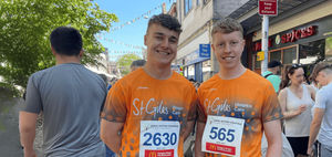 Runners Sam Colclough and Mike Dowse took part in a fundraising fun for St Giles Hospice
