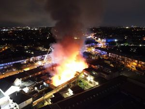 Supporting image for story: More than 70 firefighters battle major Birmingham shop fire 