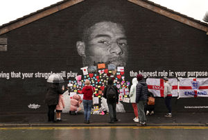 Fans have been posting messages of support on a mural of Marcus Rashford after it was defaced. Photo: Martin Rickett/PA Wire