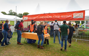 People enter Shrewsbury Food Festival, at The Quarry