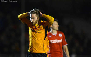 James Henry of Wolverhampton Wanderers looks dejected.