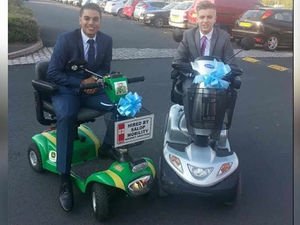 Supporting image for story: Boys just want to have fun in mobility scooter school prom arrival