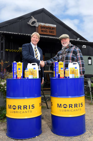 Morris Lubricants executive chairman Andrew Goddard with Simon Rouse, Shrewsbury Men’s Shed chairman.