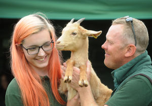 Sandwell Park Farm apprentice Millie Garbett, and farmer Wayne Vale, with Molly the goat