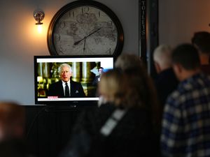 Supporting image for story: Rosemary for remembrance and Queen’s corgi vase feature in King’s address
