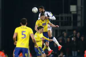 Kyle Bartley of West Bromwich Albion out-jumps Kristian Pedersen last season. (AMA)