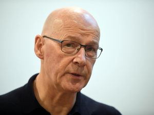 Headshot of John Swinney