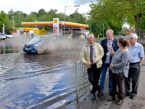 Supporting image for story: Road in Stafford still under water a week on
