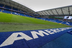 A GV / General View of the pitch at The Amex Stadium home of Brighton and Hove Albion with American Express branding along the touchline. (AMA)