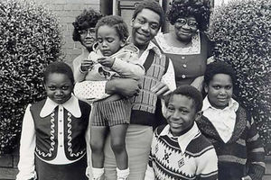 Lenny Henry with his mum and family at home in Dudley