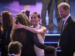 Supporting image for story: Meghan arrives at US awards ceremony in support of honouree Harry
