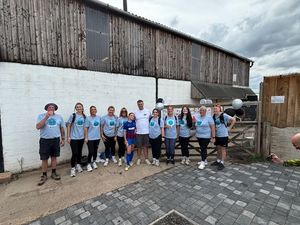Kev and his extended family ad friends after their 18-mile walk