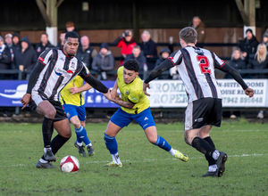 Scott Wara held back by Tremaine Eastmond. Pic: Jim Wall