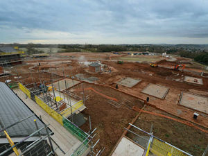 Supporting image for story: Aerial shot shows huge development rising from ground