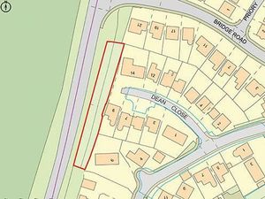 Supporting image for story: Strip of land with 'potential' next to busy A-road heading to auction - with low guide price