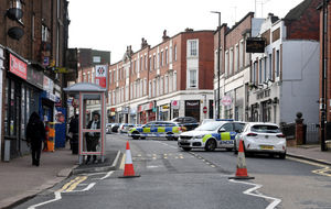 Police pictured at the scene the morning after the stabbing in New Street on April 11