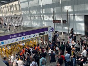 Passengers at Paddington station after London Underground services were suspended because of power failures