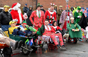 Annual festive wheelbarrow race in Wem