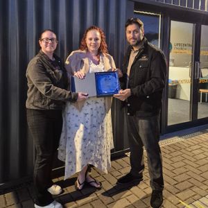 Lydia and Shaz Saleem present Award to Emily Fereday 