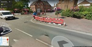 A Google Street View image captured in July 2018 shows the barriers in place
