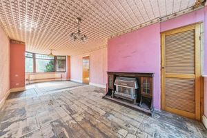 Inside the three-bedroom home in Gobowen that will be auctioned on July 25. Picture: Halls/Rightmove
