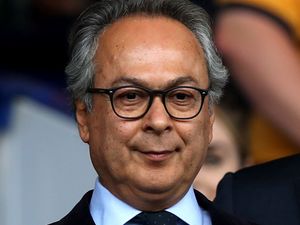 Farhad Moshiri in the crowd at a football match