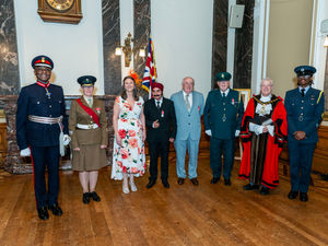 Supporting image for story: 21 amazing photos of community heroes from the Black Country as they receive their British Empire Medals