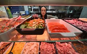 Emma Malik helps out in the Deli