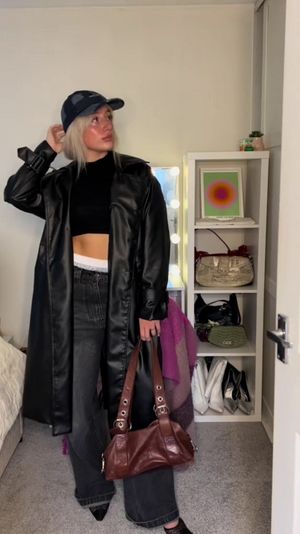 Abbie Fidgett, 22, styling boxer shorts as part of her outfits. See SWNS story SWNJouterwear. A woman wears underwear as "outerwear" to overcome her body dysmorphia - and dons lingerie, corsets and boxers to go to the beach and on nights out. Abbie Fidgett, 22, began suffering from body dysmorphia after she was bullied throughout school and college. She spent 20 weeks on a waiting list for cognitive behavioural therapy (CBT) and refused to go back to the GP after they wanted to weigh her. She wrapped up in winter coats all year round to hide her body but in November 2020 decided to ditch it for underwear instead - after trying exposure therapy wearing different outfits.