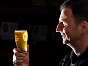 Supporting image for story: Cheers! Real ale fans raise a glass at popular festival