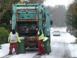 Supporting image for story: Binmen battle on to clear waste backlog