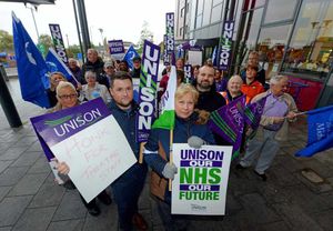 Pictured (front) are Adam Butler and Lucille Georgiou with NHS Staff on the picket line at Walsall Manor Hospital