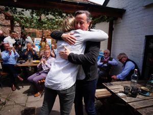 Supporting image for story: In Pictures: Tories hug it out and Keir hits shops as campaign trail continues