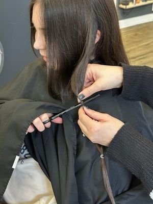 Each section of hair was carefully measured, tied and then cut