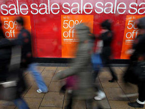Supporting image for story: Shelves are stripped in sales shopping frenzy
