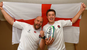 Gavin and his son Rhys, who has won a competition to deliver the match ball at the Rugby World Cup in Japan