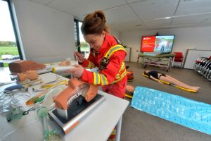 Midlands Air Ambulance at the new base, next to RAF Cosford. In red we have Paramedic: Fay Pollock