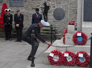 Andy Evans lays a wreath on behalf of the Royal British Legion in Knighton. Image: Karen Compton