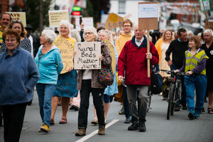 Campaigners and residents have marched in Bishop's Castle calling for health bosses to re-open inpatient beds at their hospital.