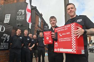 Dudley Green Fire Station crew installed a bleed kit at the White Horse with money raised from a charity car wash. Pictured front are landlord Liam Burns (left) and fire crew commander Jake Marsden. Back, from left: fire crew Luke Buckley, Matthew Harris, Adam Wright, Dave Antcliff and Max Koumides. Photo: Steve Leath