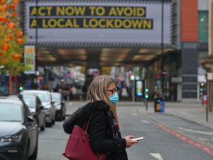 Supporting image for story: Covid rates falling in England’s big cities but rising in towns, figures show