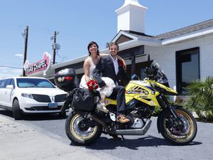Supporting image for story: Couple set new world record aboard Suzuki motorcycle