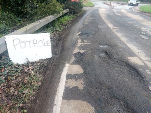 Motorists were warned about potholes at the junction of the A495/A528. Picture: Rob McBride