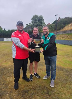 Doubles delight – Matt Beeston and (right) Rob Brassington with the St Alkmund;s Trophy and organiser Jack Hazeldine
