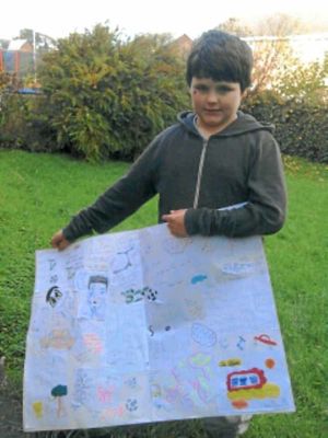 Oliver Lloyd with his get well card