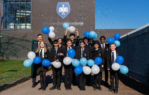 Headteacher Joe Phillips and pupils at Wednesfield Academy celebrating the Ofsted inspection result