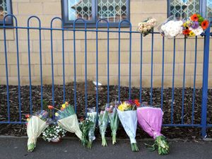 Supporting image for story: Tributes paid to school site manager and students following deadly city rampage