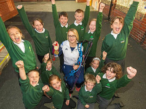 Supporting image for story: Gold medalist pays Market Drayton school a visit