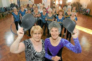 Jean Hughes (right) and Ann Bedworth (left), with members of the class after raising and donating £2,500 to Russells Hall Hospital Urology Department