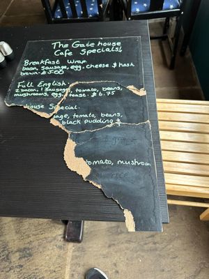 The damaged sign from the Gatehouse Cafe